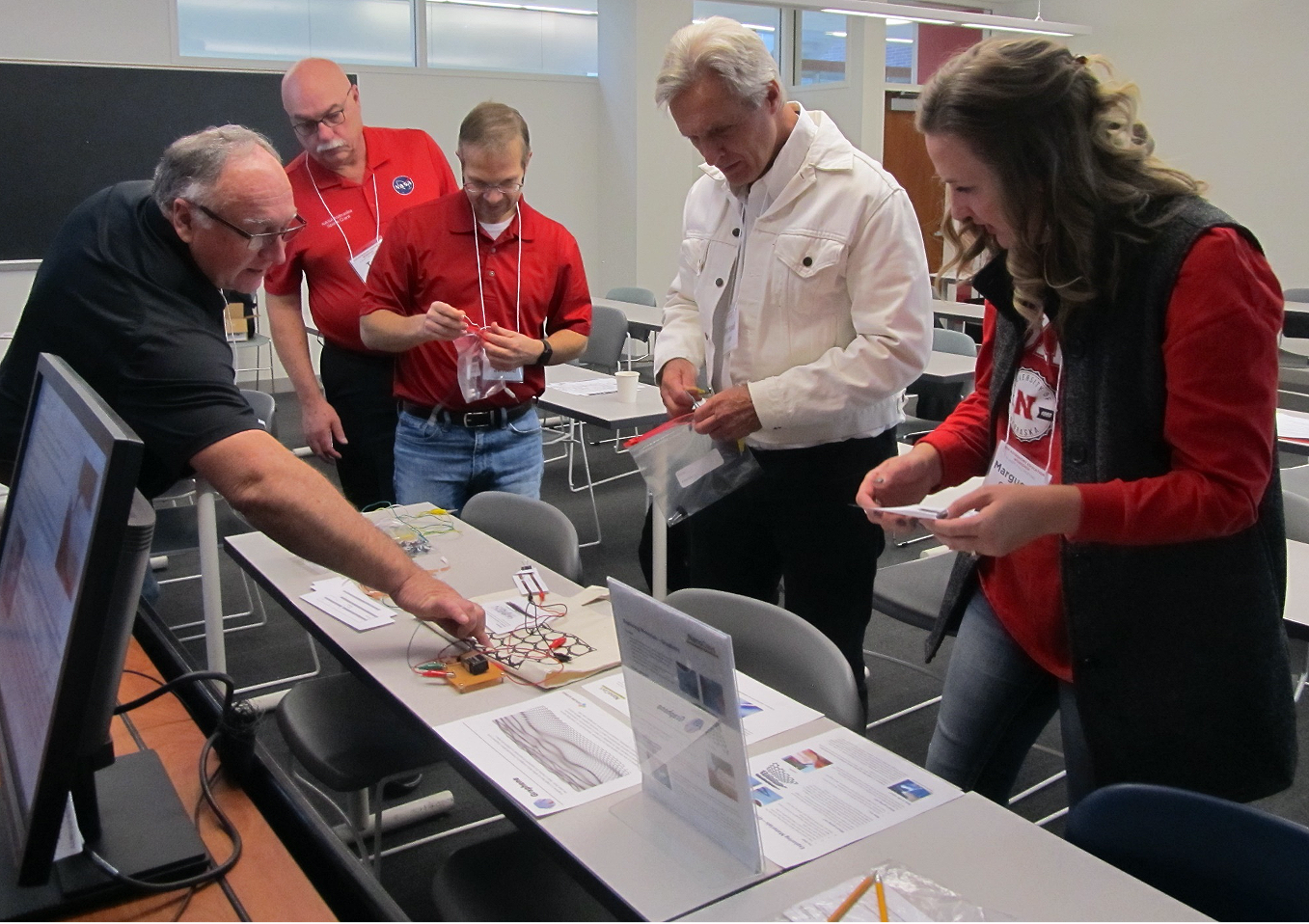 Group of science teachers receiving training they can take back to their classrooms.